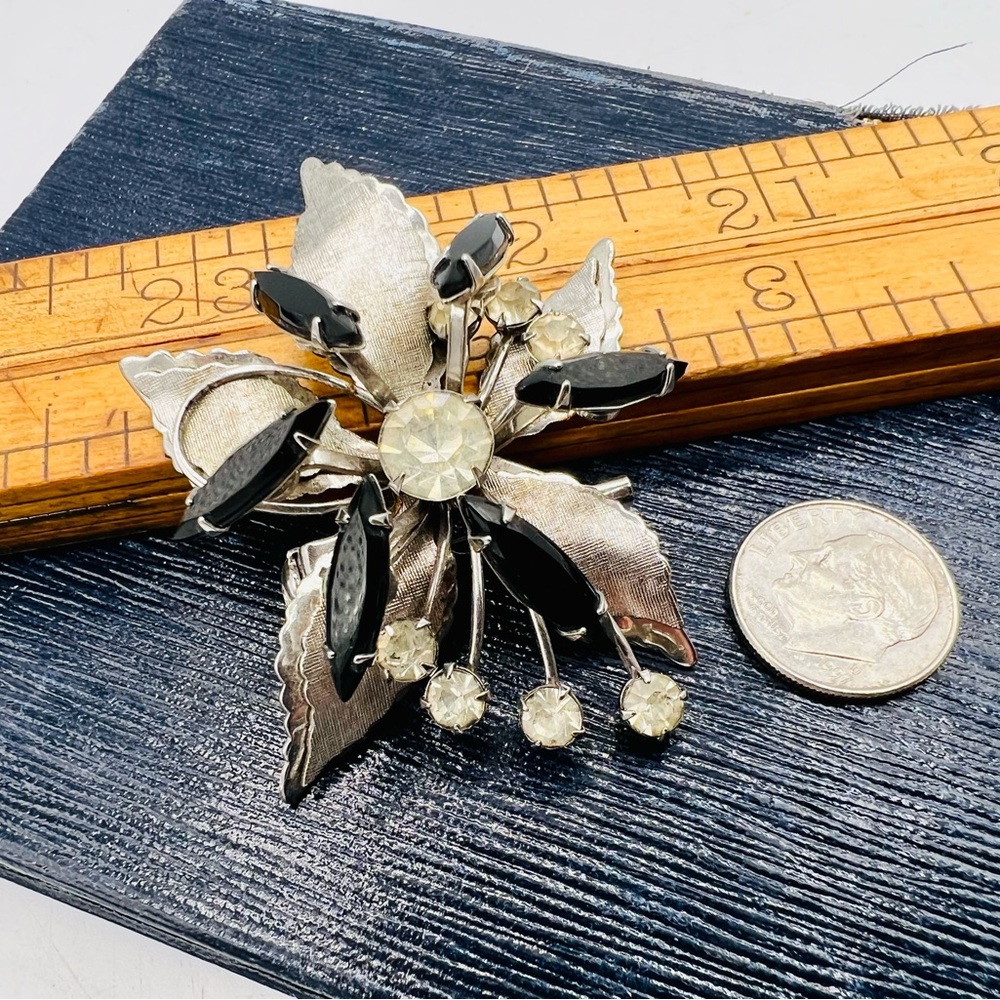 Vintage silver tone floral brooch clear & black marquis rhinestones 3D